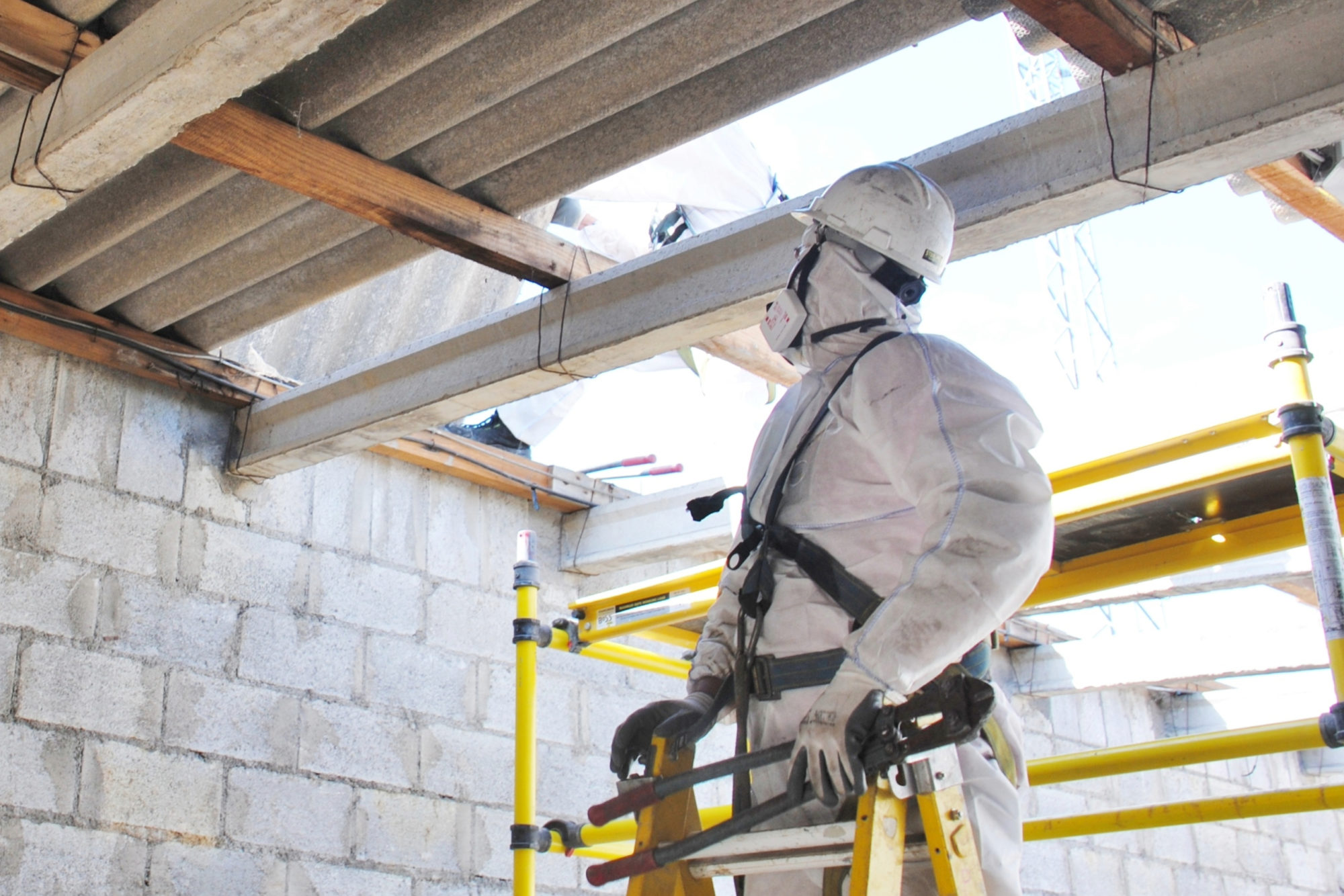 Man Checking for Asbestos